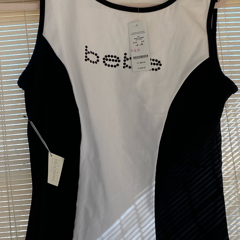 Fitted sleeveless logo top. Never worn, top has stretch. Made in USA.